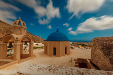 Ultra wide angle long exposure shot of the architecture of Emporio, Santorini, Greece