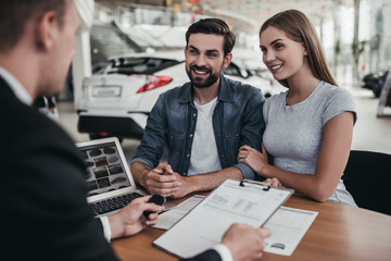 Poster - Couple at car dealership