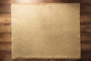 Wall Mural - burlap hessian sacking on wood