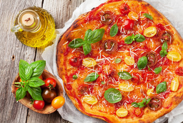 Wall Mural - Pizza with tomatoes, mozzarella and basil