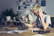 © LStockStudio - Young Designer Working in Office
