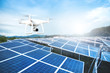 Drone with camera fly over Solar panels ; Photovoltaic systems .