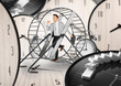 © Africa Studio - Young man running in wheel and clocks on background. Business rat race concept