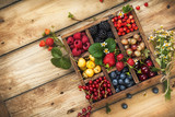 Fototapeta  - Assorted berries in box.