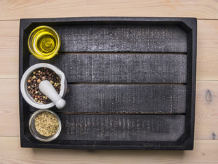 Wall Mural - Ingredients for cooking vegetarian salad with herbs and butter laid out in a wooden tray