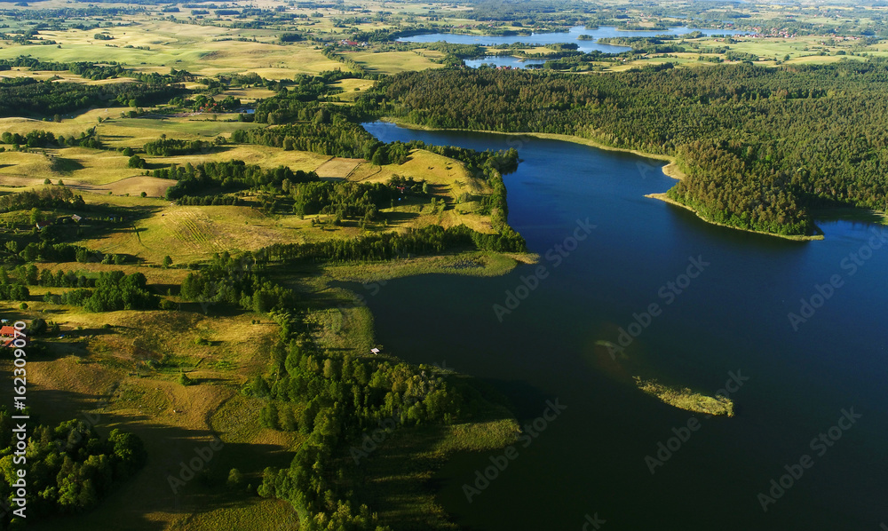Aerial view of the lake's in Masuria District, Poland - obrazy, fototapety, plakaty 