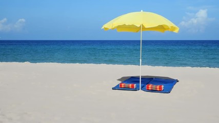 Wall Mural - Yellow Beach Umbrella on a Sandy Tropical Paradise in Thailand