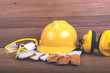 Standard construction safety,Safety equipment on wooden background with copy space