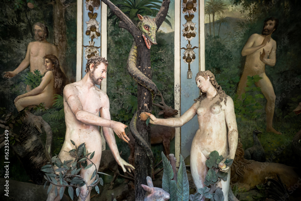 Sacro Monte di Varallo, Piedmont, Italy, June 02 2017 - biblical characters scene representation of Adam and Eve in the Eden - obrazy, fototapety, plakaty 