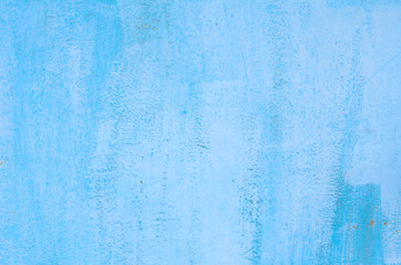 Texture of vintage painted blue iron wall background with many layers of paint