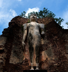 Wall Mural - Wat Phra Si lriyabot with Buddha Statues Historical Park in Kamphaeng Phet, Thailand (a part of the UNESCO World Heritage Site Historic Town of Sukhothai and Associated Historic Towns