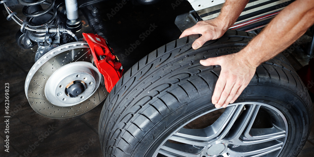 Changing a tyre in a garage