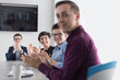 © .shock - Group of young people meeting in startup office