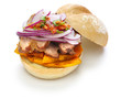 © uckyo - pan con chicharron, peruvian pork sandwich isolated on white background