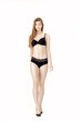 © Rychko Yevhen - Young slender woman in black lingerie isolated on white background