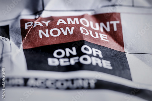 Fotografering Consumer Credit Debt Payment Now Due Crumpled Notice