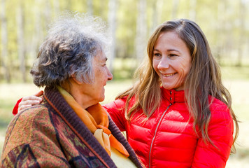 Wall Mural - Happy elderly woman with her daughter