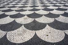 Mosaic Tiles Pavement Pattern In Funchal, Madeira, Portugal.
