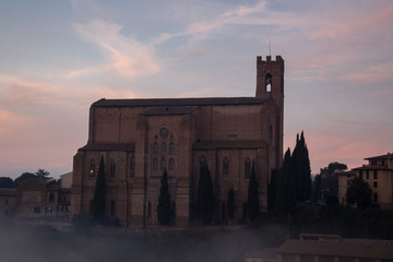 Wall Mural - Basilica Cateriniana or Basilica of San Domenico in the mist, Siena, Tuscany, Italy.