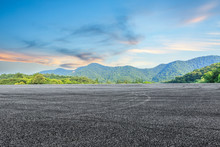 Asphalt Road And Mountain Background