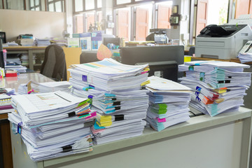 Wall Mural - Pile of unfinished documents on office desk, Stack of business paper