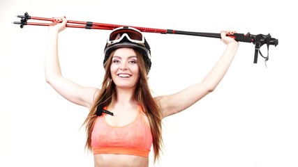 Poster - Woman skier preparing for season. Young girl with skiing gear. Winter sport activity, healthy leisure relax concept. Beautiful sportswoman on white, studio shot, full HD.