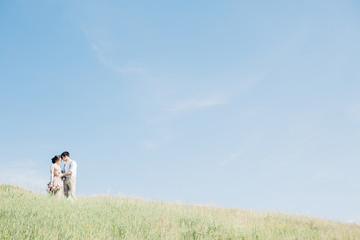 Wall Mural - wedding couple on  nature.  bride and groom hugging at  wedding. 