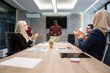 © Myvisuals - Multi-Cultural Office Staff Sitting Having Meeting Together