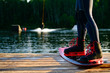 men’s feet on a wakeboard
