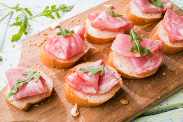 Baguette with ham and greens