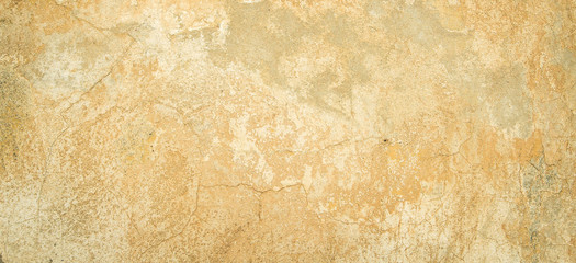 Old vintage grungy plaster painted wall texture background