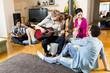 © BGStock72 - Young people playing guitar and  having a party in the house