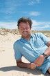 © OceanProd - handsome middle aged man outdoor at the beach portrait