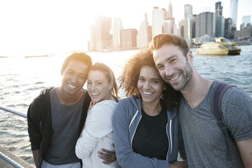 Wall Mural - Group of friends enjoying sunset on Brooklyn heights promenade, NYC