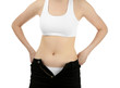 © Africa Studio - Beautiful young woman in undersized pants on white background, closeup. Diet concept