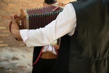 Bandoneon Player Performs