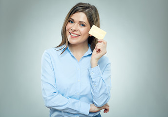 Business woman holding credit card isolated portrait