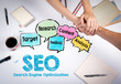 © STOATPHOTO - SEO Search Engine Optimization concept. The meeting at the white office table.