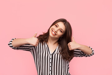 Wall Mural - Woman showing thumbs up