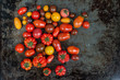 Variety of heirloom tomatoes, top view flat lay