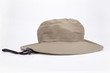 Khaki adventure hat on a white surface. Safari hat isolated on white background.