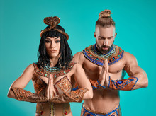 The Man, Woman In The Images Of Egyptian Pharaoh And Cleopatra