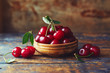 © Melica - Cherries in a bowl on a wooden table