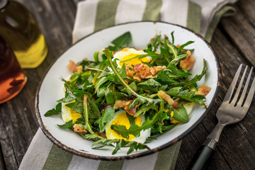 Wall Mural - Dandelion salad with eggs and bacon