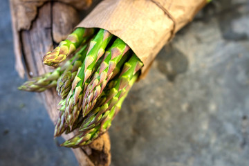 Wall Mural - Asparagus on rustic wooden background