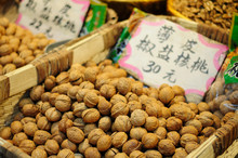 Whole Walnuts For Sale At A Stand Within The Muslim Quarter In The City Of Xian China Located In Shaanxi Province.