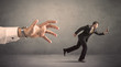 © ra2 studio - Businessman running from hand
