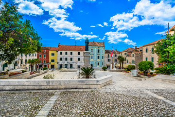 Wall Mural - Town Makarska old square. / View at amazing historic square in city center of town Makarska, tourist resort in Croatia, Europe.