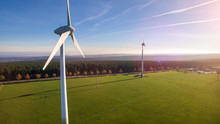 Windmill At Windfarm On A Sunny Summer Day - Aerial Shot