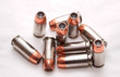 40 caliber hollow point bullets with a white background